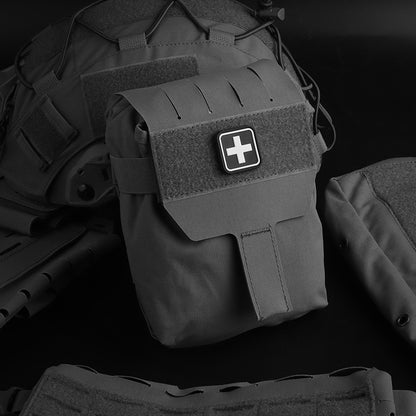 One-handed quick access deployment trauma kit